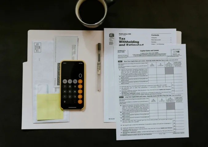 tax paperwork and cup of coffee