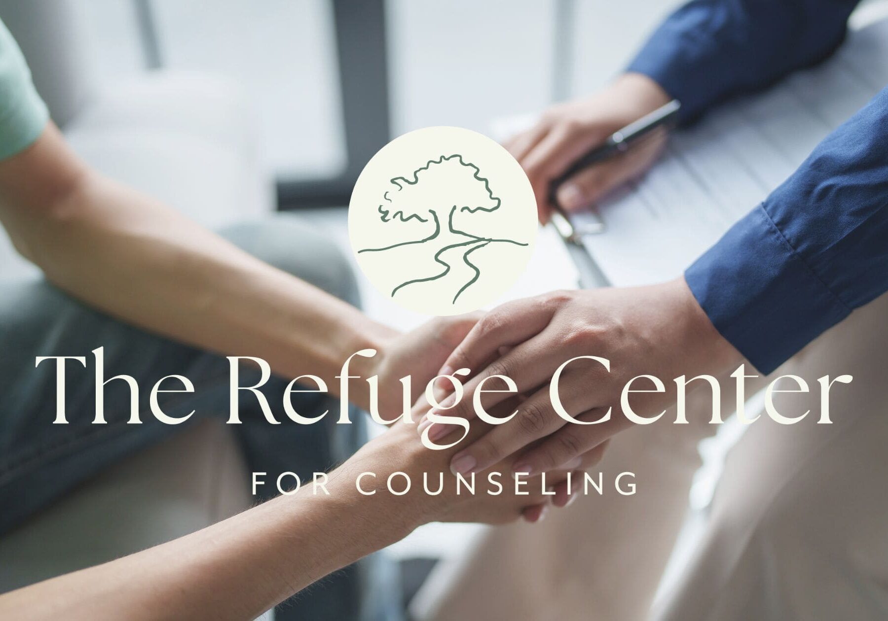 The Refuge Center logo over hands