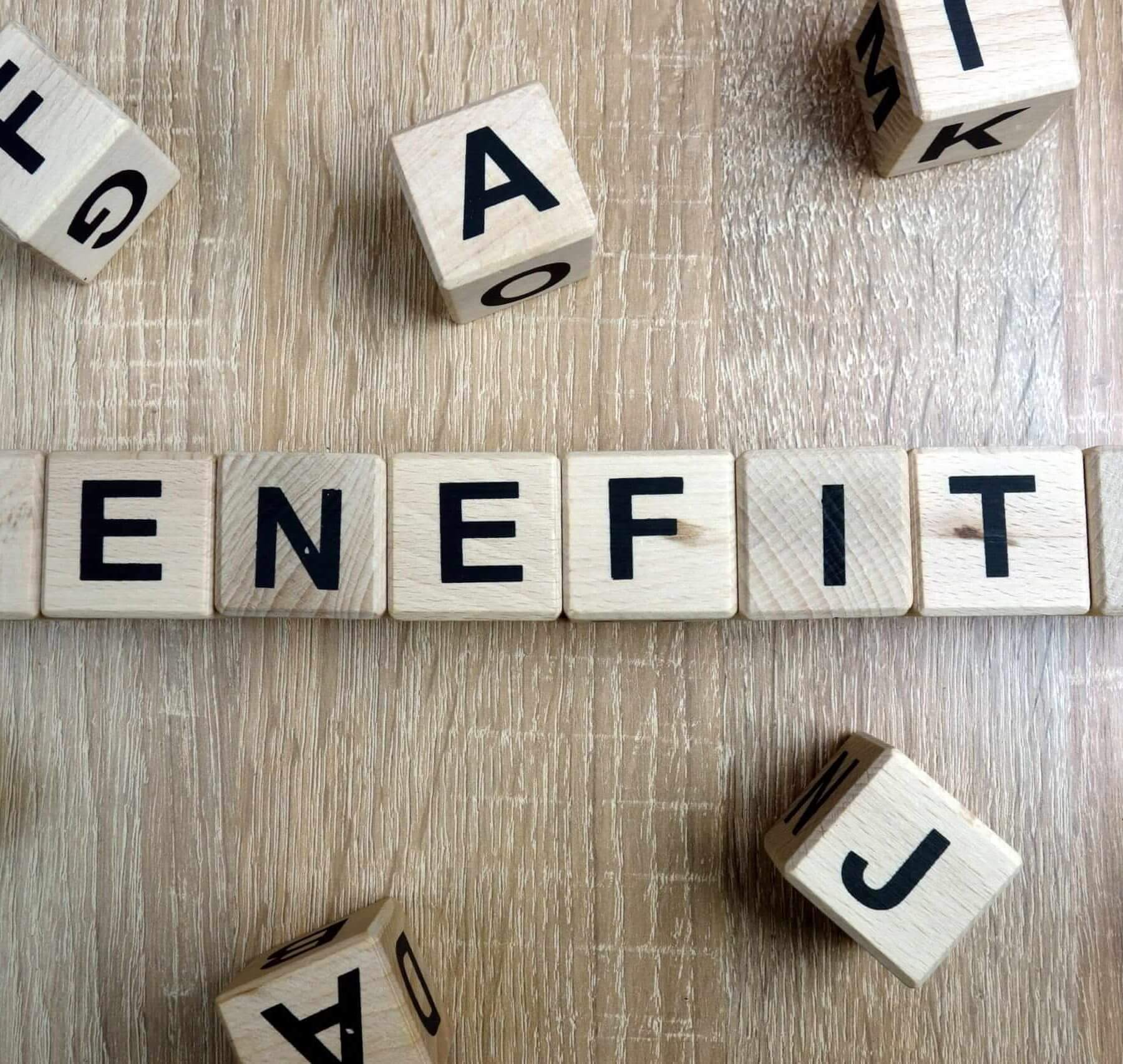 benefits spelled in wooden blocks