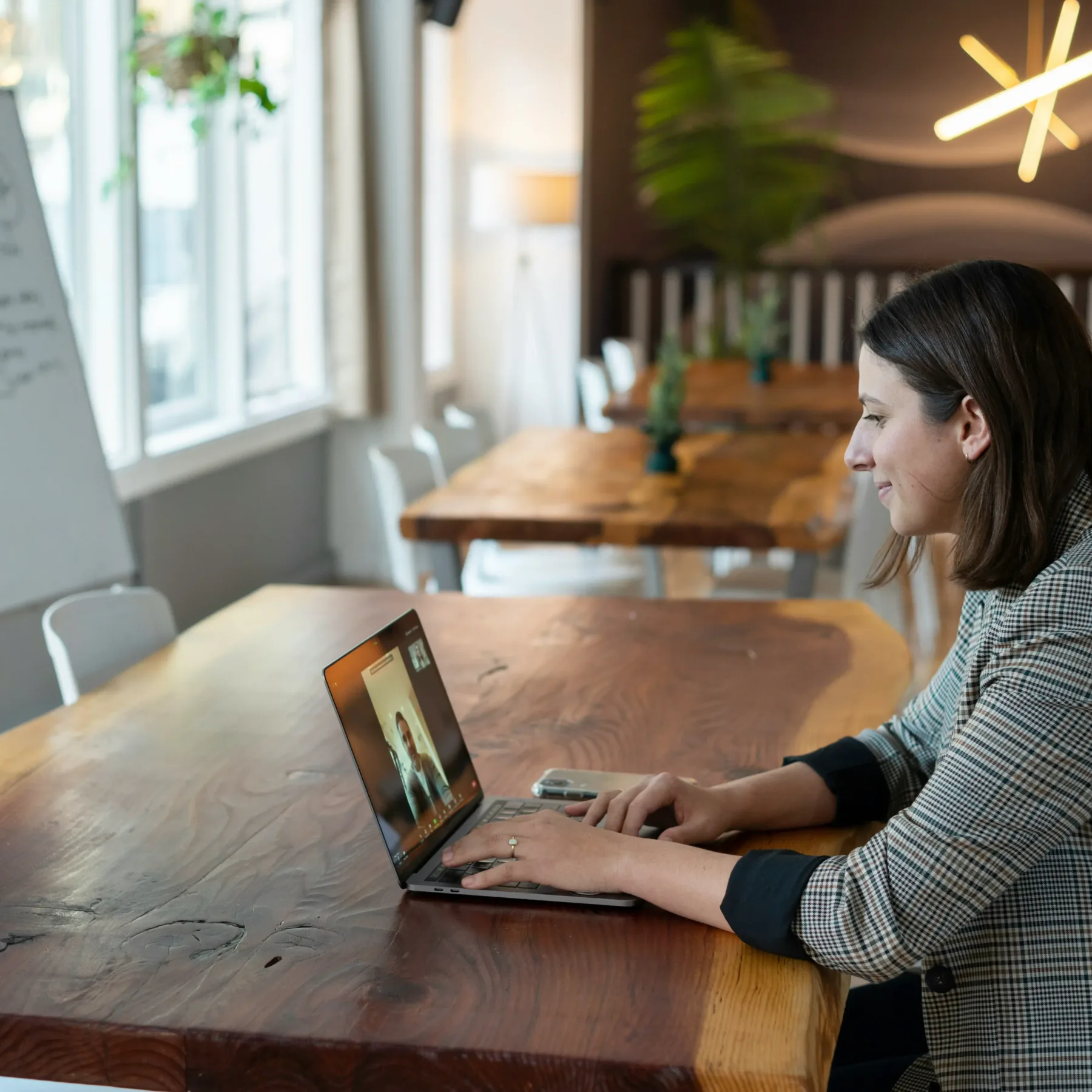 woman-taking-call-from-computer