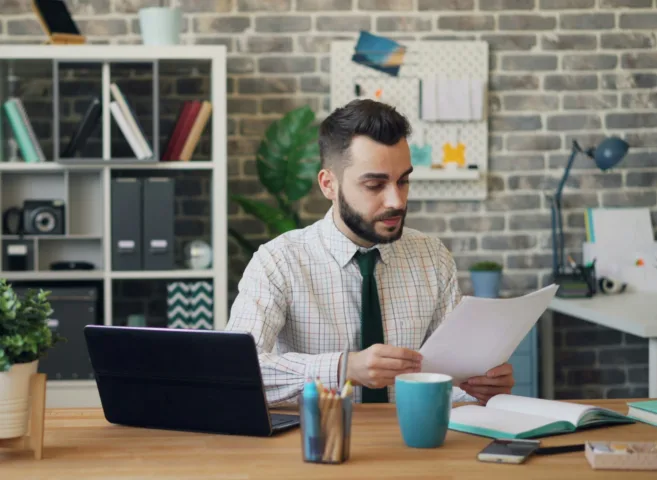 hr professional reviewing employee documents